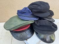Stack of five caps showing colours and styles