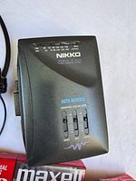 Front view of Nikko NFS440 cassette player showing controls and branding