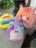 All three Squishmallows arranged together showing fronts and overall condition