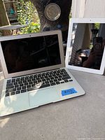 MacBook Air laptop next to iPad tablet