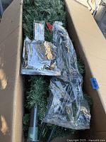 Tree sections, pole, stand parts in box