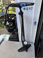 Full view of Raleigh floor pump showing handle, barrel, base, and gauge