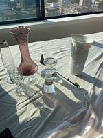 Group shot displaying all five items on tabletop in daylight.