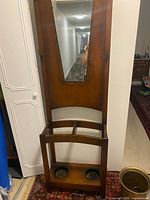 Front view showing full hall stand, mirror, hooks, umbrella rack, drip pans