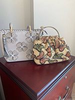 Front view of both handbags together to show size, design and colour