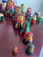Multiple nested matryoshka dolls displayed on tabletop