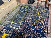 coffee table and side table tops with tape measures showing dimensions