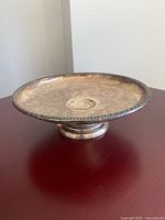 Side view of tarnished sterling pedestal dish