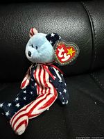 Front view of Spangle bear showing full body and tag