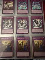 First binder page with trap card duplicates including Speedroid Duplicate and Liberty at Last!