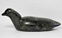 Left profile of soapstone bird carving