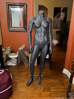 Front view of mannequin on glass base