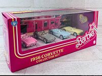 Front view of sealed Barbie 1956 Corvette Collector Set box showing four cars