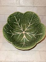 Top view of textured green cabbage leaf bowl interior