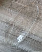 Full view of clear glass salmon platter on floor