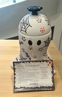 Front view of ghost cookie jar with recipe card