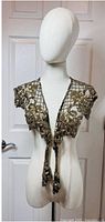 Front view of Sharmark gold beaded shawl on mannequin