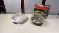 Overall view of both casserole dishes with lids and Brentwood box