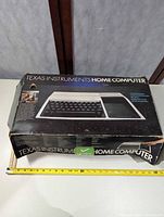 Retail box top with product image and tape measure