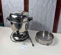Overall view of coffee urn with accessories