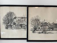 Two framed cottage drawings side by side