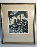 Front view of framed etching showing artwork, mat and frame