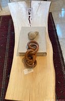 Top view of entire live-edge willow coffee table with decorative objects for scale