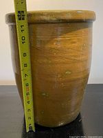 Front view showing crock shape and glaze