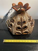 Full lamp with chain, tape measure showing width