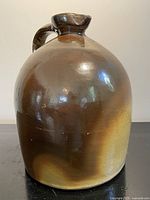 full view of glazed stoneware jug