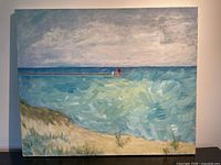 Full view of framed oil on canvas showing beach, sea and sky