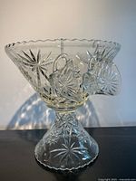 assembled punch bowl on pedestal with cups hanging