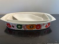 All three nested dishes showing sizes and pattern