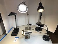 All five desk/task lamps displayed powered on