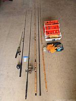 All rods, reels and tackle box laid out
