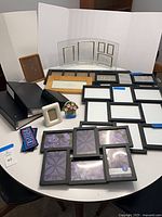 Overview of all frames, albums and decor on table
