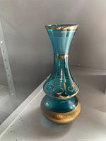 Full view of vase on shelf