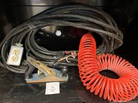 Overall lot showing extension cord, air hose, hand plane