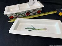 Divided dish and matching platter showing size against tape measure