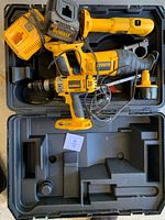 Overview of DEWALT chargers and tools inside carry case