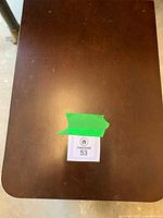 Top view of dark brown wood grain cabinet heater