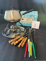 Complete fondue set with pot, stand, 12 forks and box