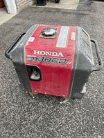 Left-front and top view showing overall exterior, model name and attached casters