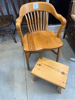 Oak armchair and pine foot stool together