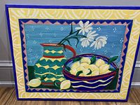 Front view of signed acrylic painting showing subject matter and painted border