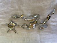 Group view showing all four Hoselton aluminum sculptures