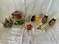 Group shot of all eight novelty salt and pepper shaker pairs