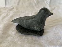 Side view of soapstone seal on slab base