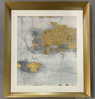 Front view showing entire abstract print with gold frame and mat