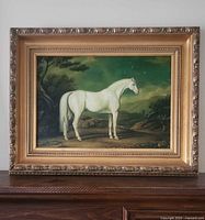 Front view of framed painting showing white horse and frame detail